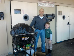 A family supporting FISH by returning bottles and cans